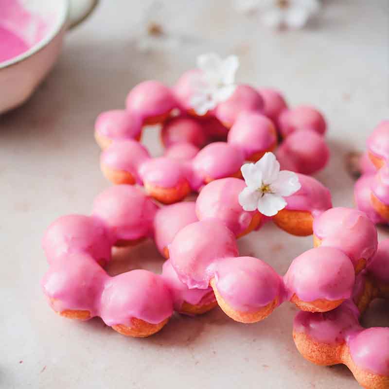 Suncore Foods Velvet Red Beet Glazed Flower Pong de Ring Donuts